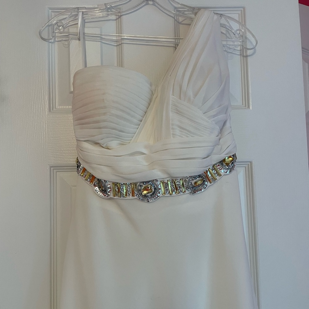 White one shouldered floor length gown with silver & gold beaded belt and strap